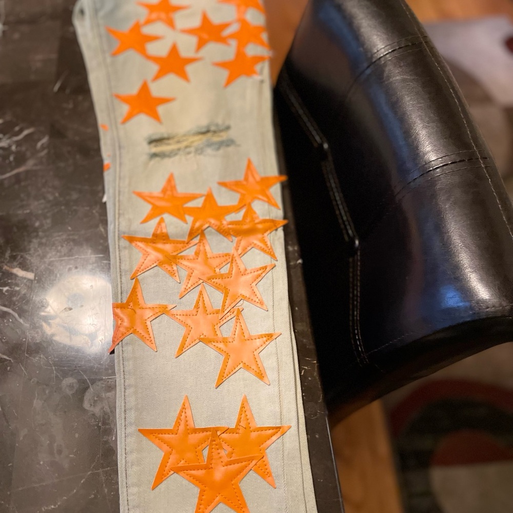 AMIRI Blue Jeans with Orange Star Detail
